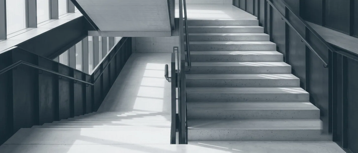 Abstract view of an empty concrete and steel stair