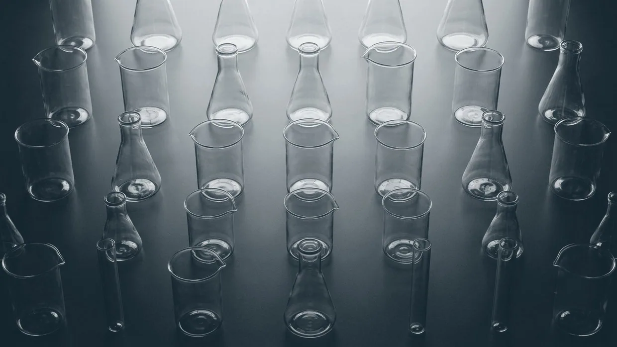 Abstract arrangement of empty laboratory glassware
